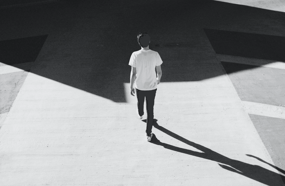 Shadow of a walking person.